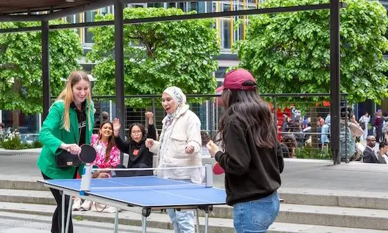 Students playing ping pong
